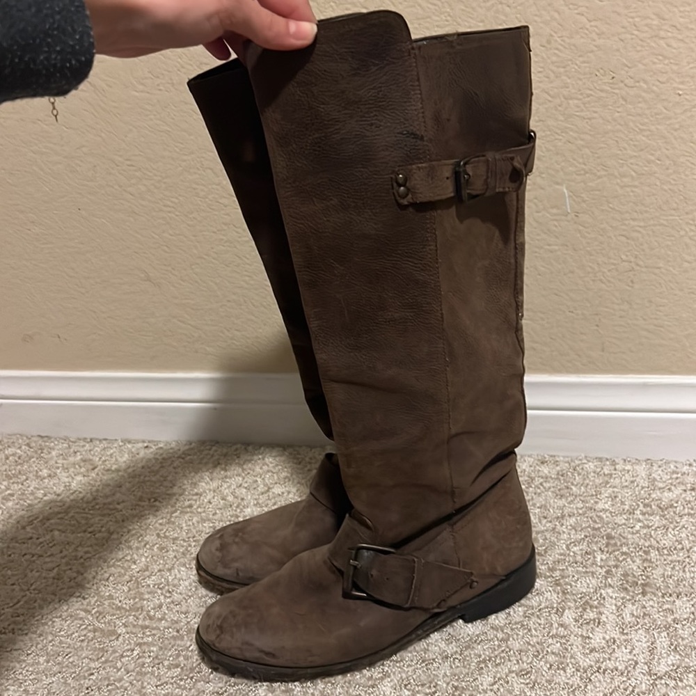 Real leather brown boots with buckles and studs up the back